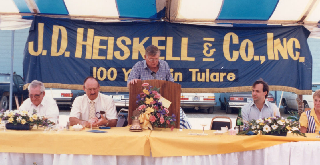 Vintage photo of Dale speaking at 100 year celebration.