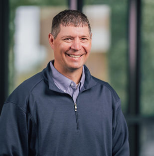 Headshot of Chris Arnold, President, Hawkeye Gold