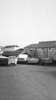 An old black and white photo of a cotton gin mill in 1935.